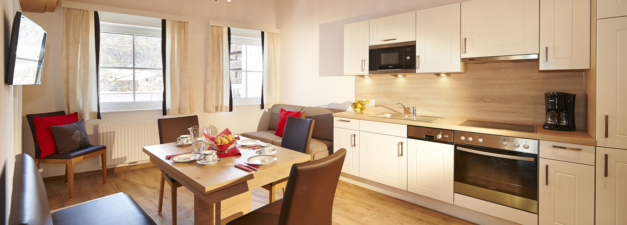 Kitchen with dining place at the apartments Weitgasser Kitchen with dining place at the apartments Weitgasser